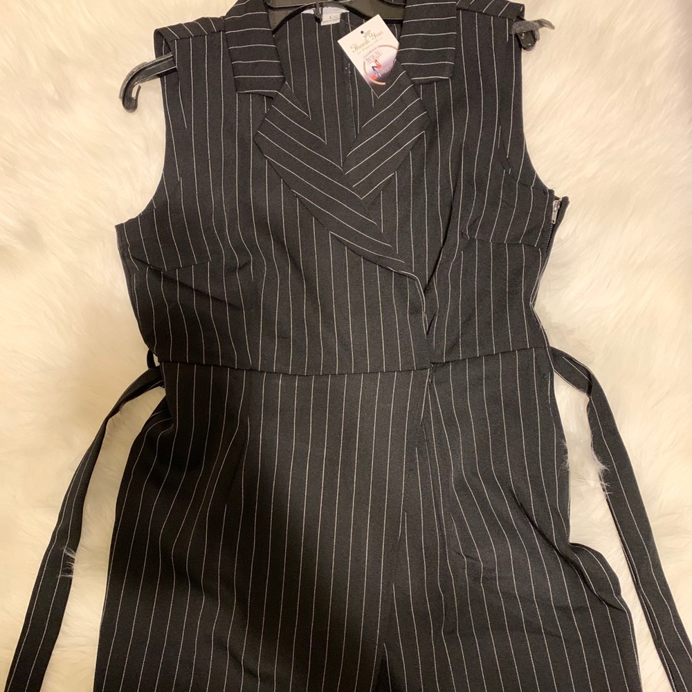 Plaid Shorts with lap front, side zipper  has belt